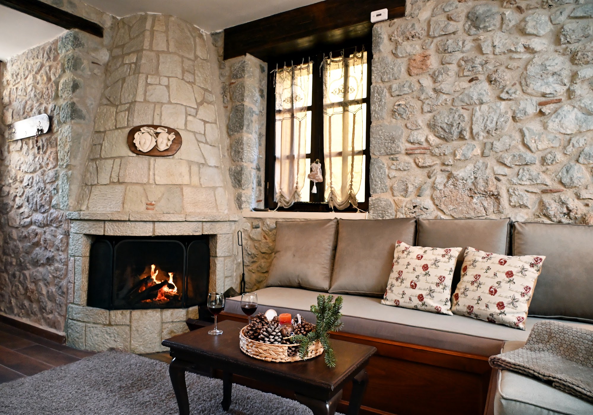 Stone fireplace and seating area.